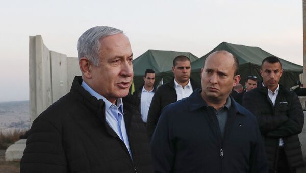 Israel's Prime Minister Benjamin Netanyahu (L) and Defence Minister Naftali Bennett (2nd) visit an army base in the Israeli-annexed Golan Heights overlooking Syrian territory, on November 24, 2019.  - Sputnik International