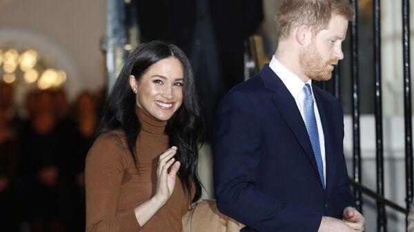 In this Jan. 7, 2020, file photo, Britain's Prince Harry and Meghan, Duchess of Sussex leave after visiting Canada House in London, after their recent stay in Canada - Sputnik International