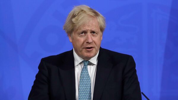 Britain's Prime Minister Boris Johnson speaks at a news conference about the ongoing coronavirus disease (COVID-19) outbreak, in London, Britain May 14, 2021 - Sputnik International