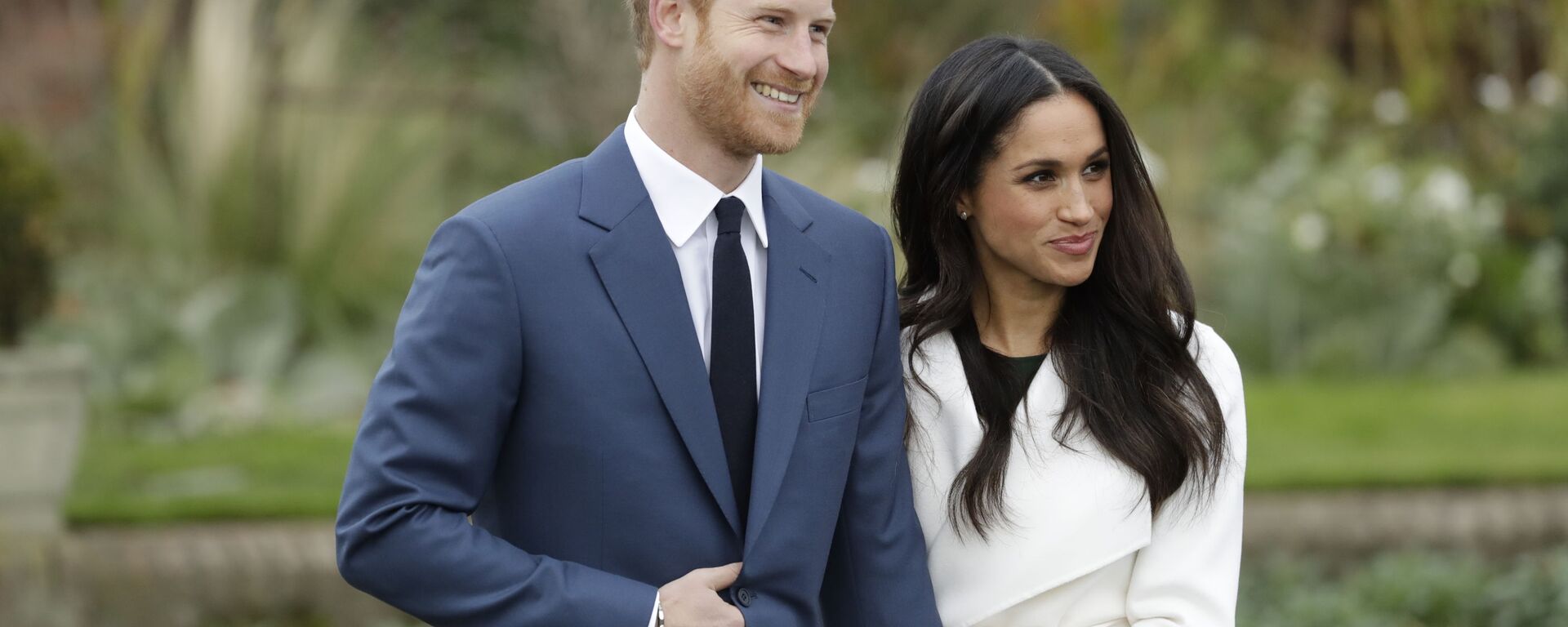 Britain's Prince Harry and his fiancee Meghan Markle pose for photographers during a photocall in the grounds of Kensington Palace in London, Monday Nov. 27, 2017 - Sputnik International, 1920, 29.06.2021