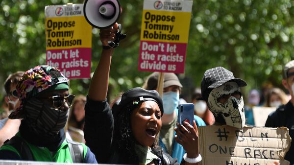 In this Saturday, June 13, 2020 file photo Sasha Johnson, center, of the Black Lives Matter movement attends a protest at Hyde Park in London - Sputnik International