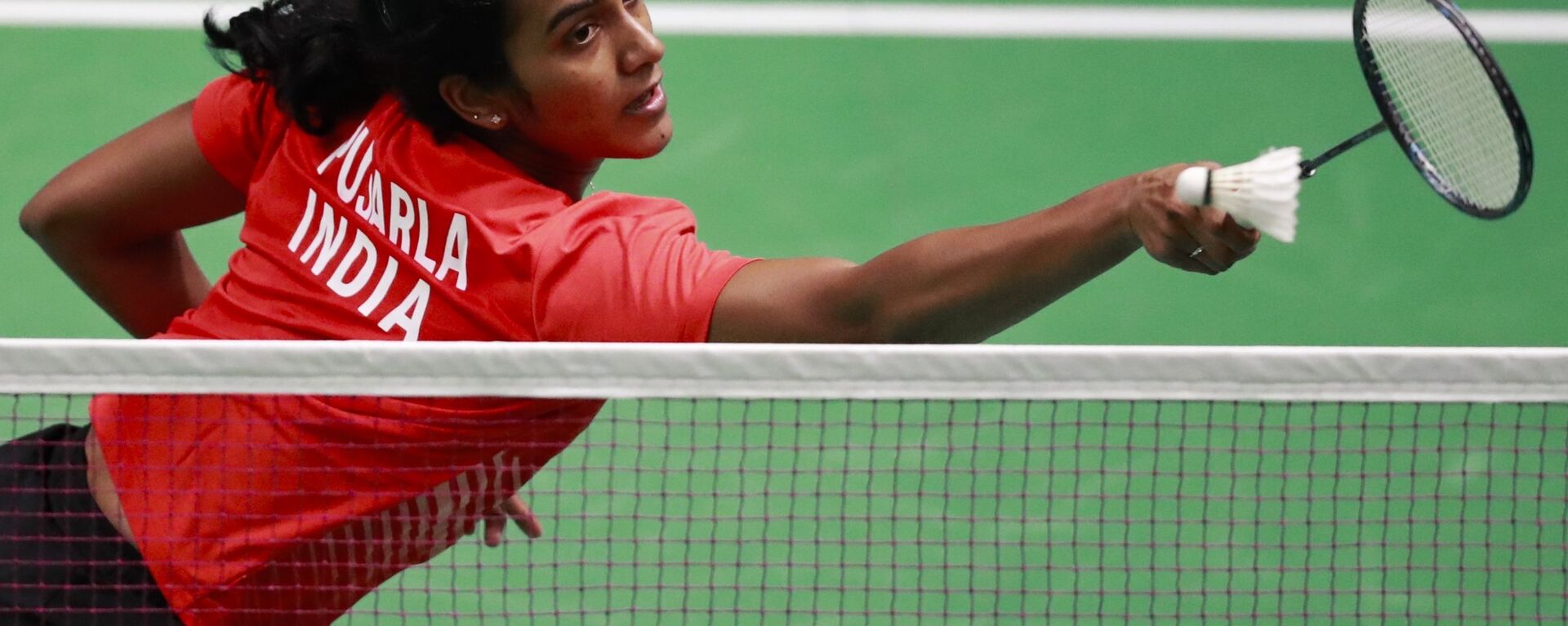India's P.V. Sindhu returns the ball to Vietnam's Vu Thi Trang during their women's single badminton match at 18th Asian Games in Jakarta, Indonesia, Thursday, Aug. 23, 2018 - Sputnik International, 1920, 26.01.2023