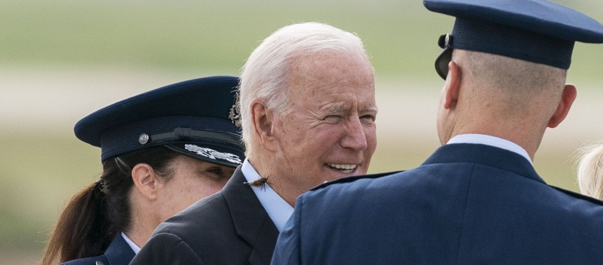 President Joe Biden, with a brood X cicada on his back, walks to board Air Force One upon departure, Wednesday, June 9, 2021, at Andrews Air Force Base, Md. Biden is embarking on the first overseas trip of his term, and is eager to reassert the United States on the world stage, steadying European allies deeply shaken by his predecessor and pushing democracy as the only bulwark to the rising forces of authoritarianism. - Sputnik International, 1920, 09.06.2021