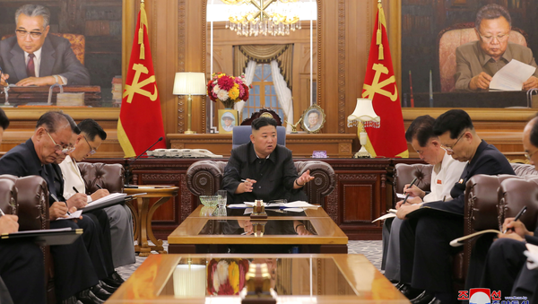  KCNA image of North Korean leader Kim Jong Un at a meeting with senior officials from the Workers' Party of Korea (WPK) Central Committee and Provincial Party Committees in Pyongyang, June 8, 2021. - Sputnik International