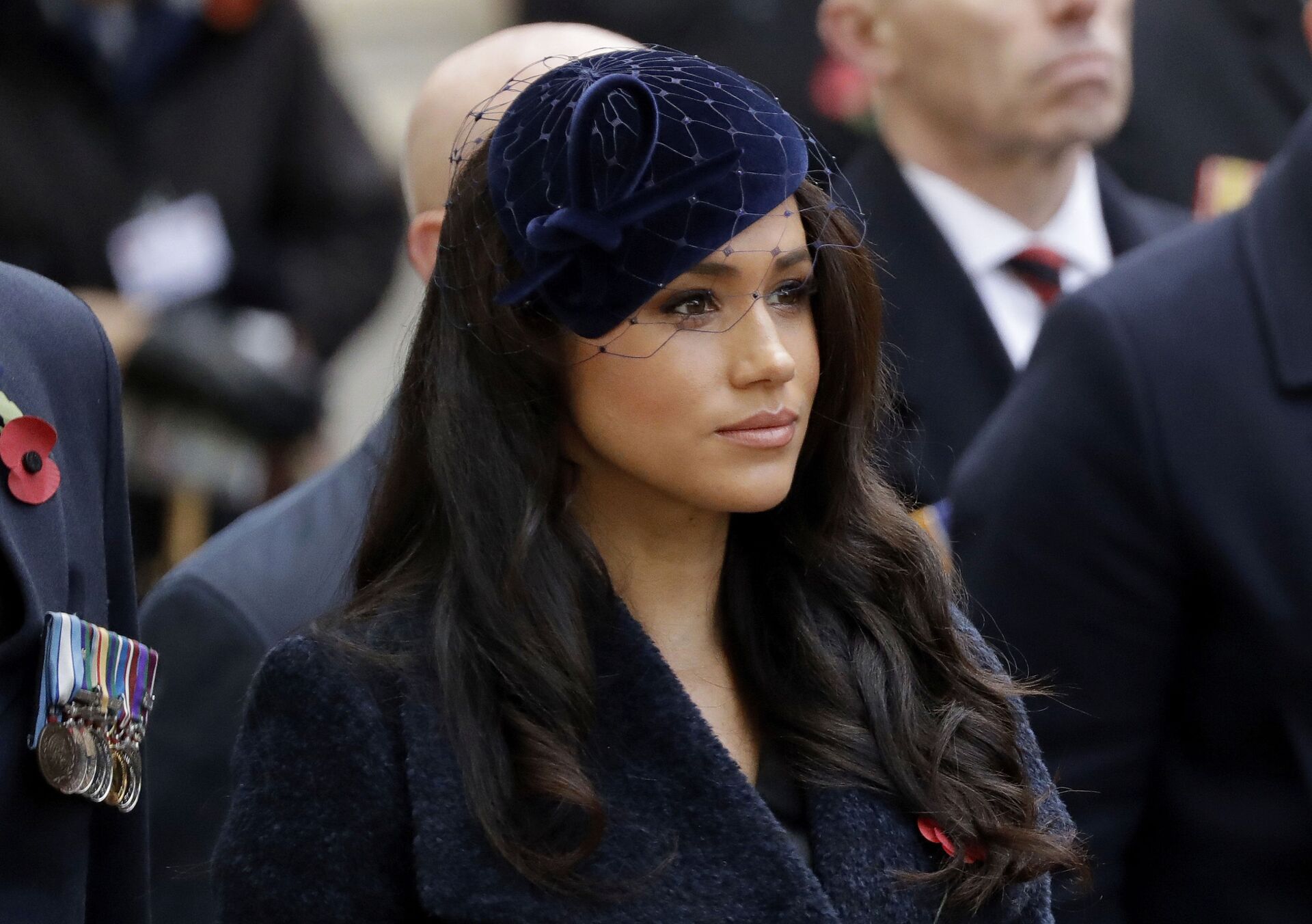 In this Thursday, Nov. 7, 2019 file photo Meghan the Duchess of Sussex stands after she and her husband Britain's Prince Harry placed a Cross of Remembrance as they attend the official opening of the annual Field of Remembrance at Westminster Abbey in London - Sputnik International, 1920, 23.11.2021