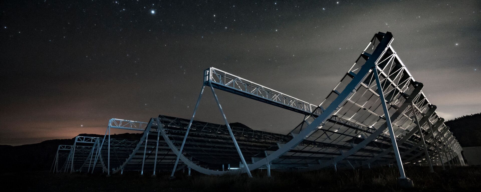This handout picture taken on November 3, 2016 and released by CHIME Collaboration on November 4, 2020 shows the CHIME Telescope, located at the Dominion Radio Astrophysical Observatory, a national facility for astronomy operated by the National Research Council of Canada - Sputnik International, 1920, 10.06.2021