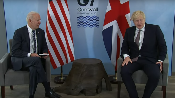 US President Joe Biden and British Prime Minister Boris Johnson meet during Biden's trip to Europe. June 2021. - Sputnik International
