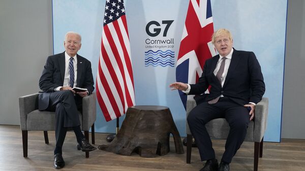 President Joe Biden and British Prime Minister Boris Johnson visit during a bilateral meeting ahead of the G-7 summit, Thursday, June 10, 2021, in Carbis Bay, England - Sputnik International