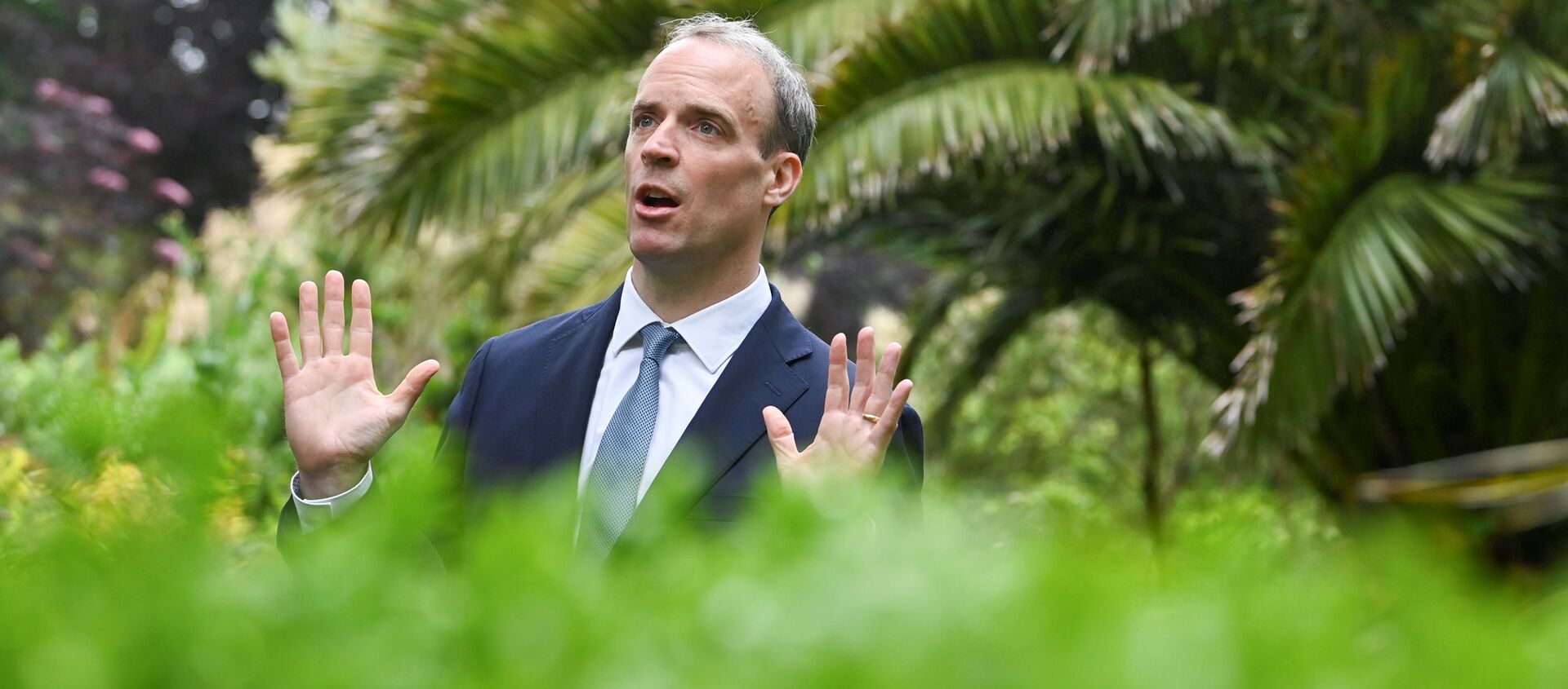 Britain's Foreign Secretary Dominic Raab gestures during an interview with Reuters on the sidelines of G7 summit in Carbis Bay, Cornwall, Britain, June 11, 2021. - Sputnik International, 1920