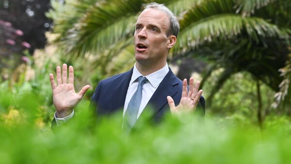 Britain's Foreign Secretary Dominic Raab gestures during an interview with Reuters on the sidelines of G7 summit in Carbis Bay, Cornwall, Britain, June 11, 2021. - Sputnik International