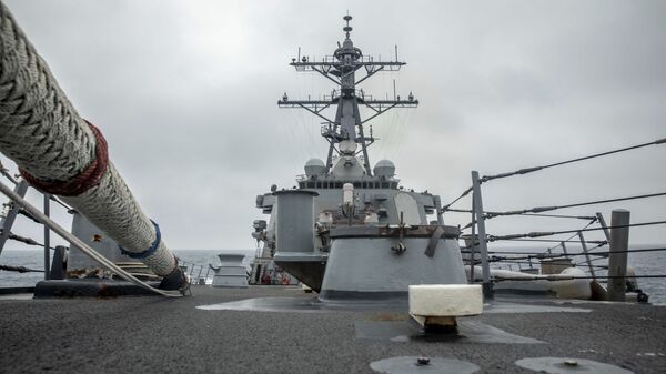 In this photo released by the U.S. Navy, the U.S. Arleigh Burke-class guided-missile destroyer USS Curtis Wilbur (DDG 54) conducts routine operations in the Taiwan Strait, May 18, 2021. - Sputnik International