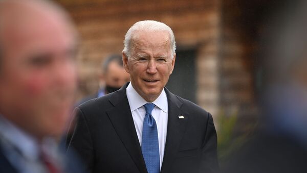 U.S. President Joe Biden walks between engagements at the G7 summit in Carbis Bay, Cornwall, Britain, June 11, 2021.  - Sputnik International