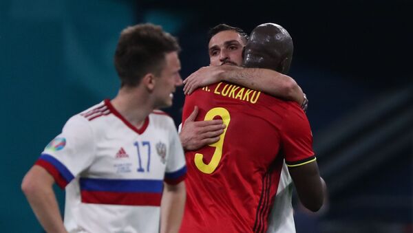 Belgium's Romelu Lukaku and Russia's Magomed Ozdoyev after the match - Sputnik International