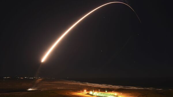 In this Feb. 23, 2021, file photo released by the U.S. Army Space and Missile Defense Command, an unarmed Minuteman 3 intercontinental ballistic missile launches during an operation test at Vandenberg Air Force Base, Calif. - Sputnik International
