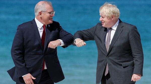 Britain's Prime Minister Boris Johnson greets Australia's Prime Minister Scott Morrison during an official welcome at the G7 summit in Carbis Bay, Cornwall, Britain, 12 June 2021.  - Sputnik International