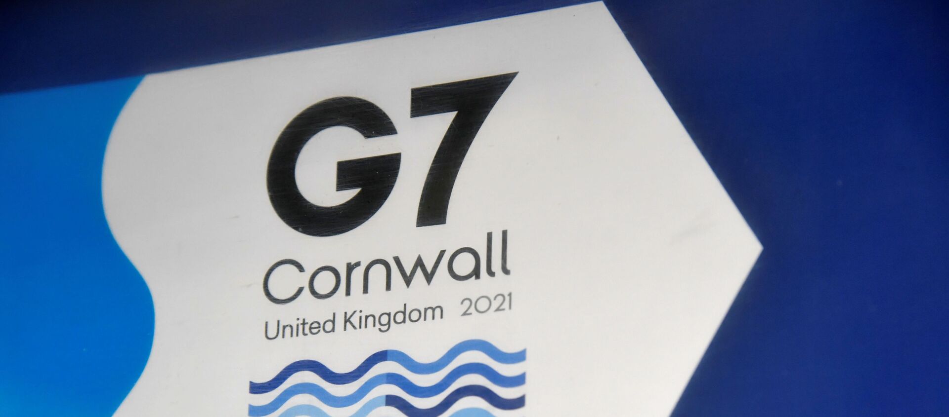 A G7 logo is seen on an information sign near the Carbis Bay hotel resort, where an in-person G7 summit of global leaders is due to take place in June, St Ives, Cornwall, southwest Britain May 24, 2021. Picture taken May 24, 2021.  - Sputnik International, 1920