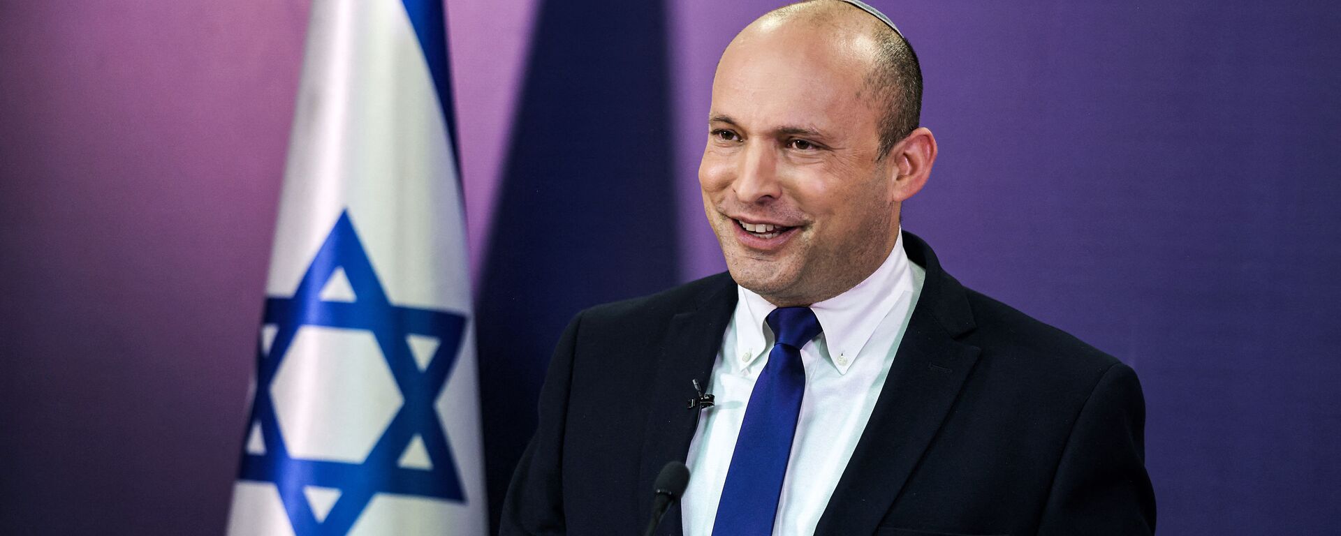 Naftali Bennett, Israeli parliament member from the Yamina party, gives a statement at the Knesset, Israel's parliament, in Jerusalem on June 6, 2021. - In power for 12 consecutive years, Israel's embattled Prime Minister Benjamin Netanyahu faces being toppled by a motley coalition of lawmakers united only by their shared hostility towards him. Under the agreement, the right-wing nationalist Bennett would be premier for two years, to be replaced by the centrist Yair Lapid of the Yesh Atid party in 2023. - Sputnik International, 1920