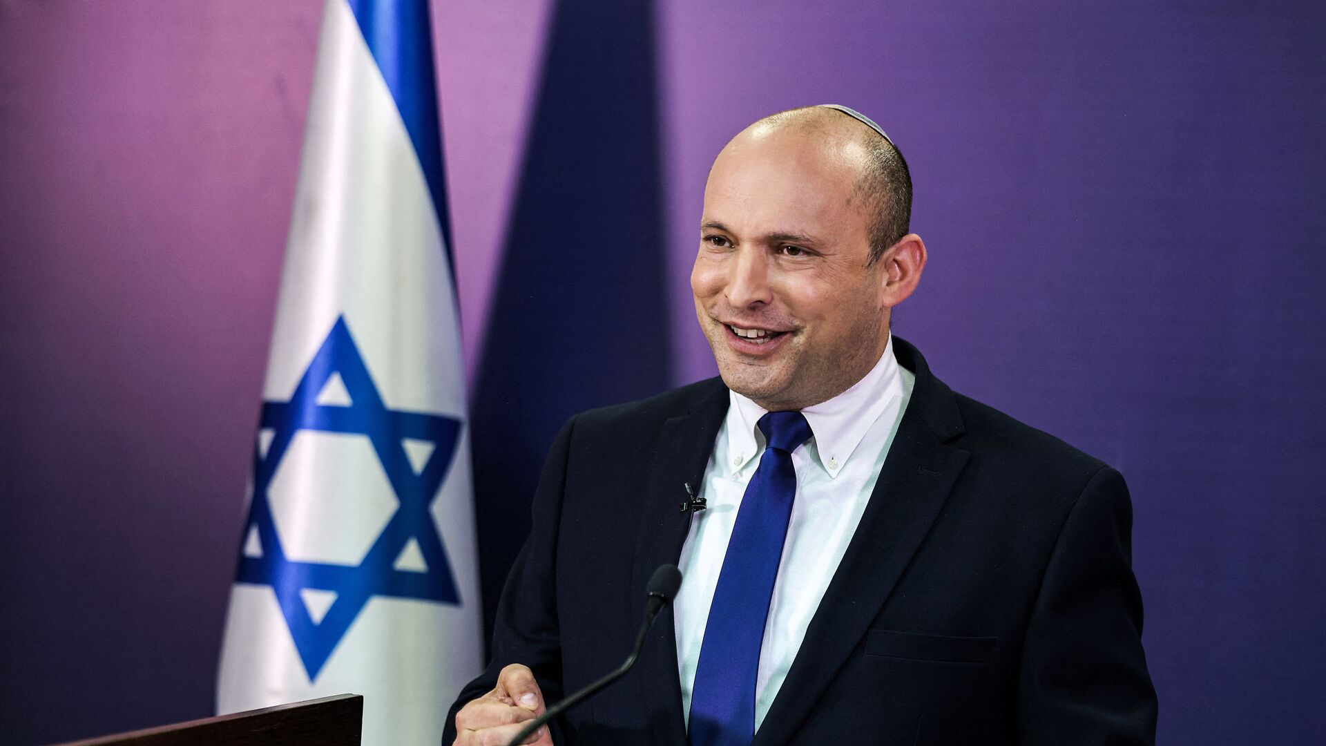 Naftali Bennett, Israeli parliament member from the Yamina party, gives a statement at the Knesset, Israel's parliament, in Jerusalem on June 6, 2021. - In power for 12 consecutive years, Israel's embattled Prime Minister Benjamin Netanyahu faces being toppled by a motley coalition of lawmakers united only by their shared hostility towards him. Under the agreement, the right-wing nationalist Bennett would be premier for two years, to be replaced by the centrist Yair Lapid of the Yesh Atid party in 2023. - Sputnik International, 1920, 24.05.2022