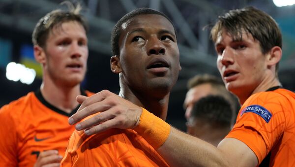 Netherlands v Ukraine - Johan Cruyff Arena, Amsterdam, Netherlands - June 13, 2021 Netherlands' Georginio Wijnaldum celebrates scoring their first goal with teammates - Sputnik International