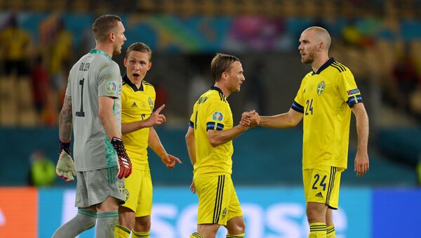 Sweden's Marcus Danielson celebrate with teammates after the match Spain v Sweden, La Cartuja, Seville, Spain, June 14, 2021 - Sputnik International