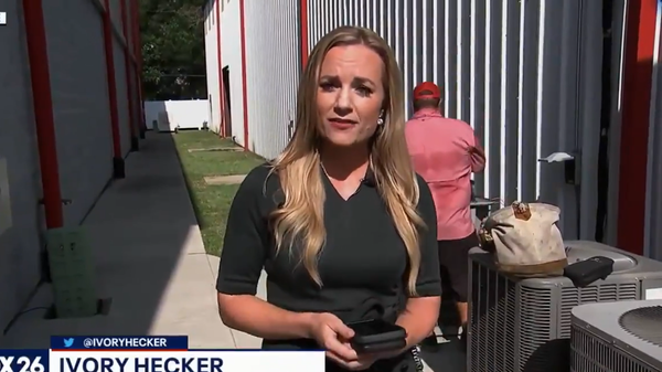 Screenshot from a video of live reporting by Ivory Hecker, a former Fox 26 journalist, who claims that the network was muzzling her reporting, while accusing the media outlet of censorship - Sputnik International