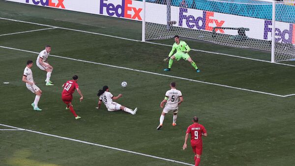 Denmark's forward Yussuf Poulsen (3rd-L) shoots and scores a goal during the UEFA EURO 2020 Group B football match between Denmark and Belgium at the Parken Stadium in Copenhagen on June 17, 2021. - Sputnik International