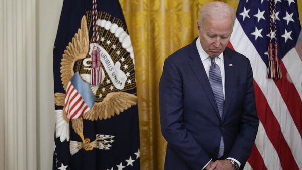 US President Joe Biden waits to speak before signing the Juneteenth National Independence Day Act into law in the East Room of the White House on 17 June 2021 in Washington, DC.  - Sputnik International