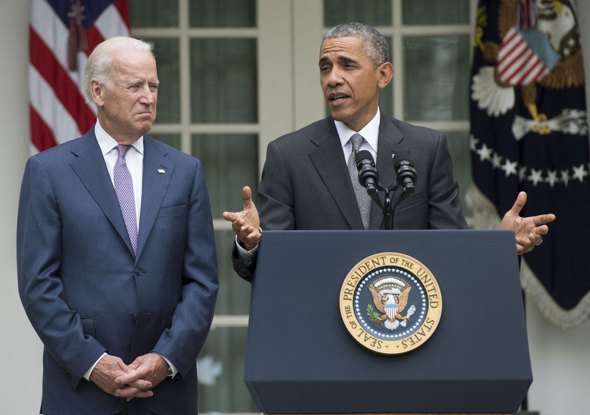 US President Barack Obama speaks alongside US Vice President Joe Biden about the Supreme Court's ruling to uphold the subsidies that comprise the Affordable Care Act, known as Obamacare, in the Rose Garden of the White House in Washington, DC, June 25, 2015 - Sputnik International, 1920, 08.09.2021