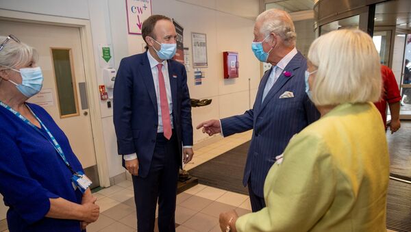 Britain's Prince Charles and Health Secretary Matt Hancock meet with NHS staff during a visit to Chelsea and Westminster hospital in London, Britain, 17 June 2021 - Sputnik International