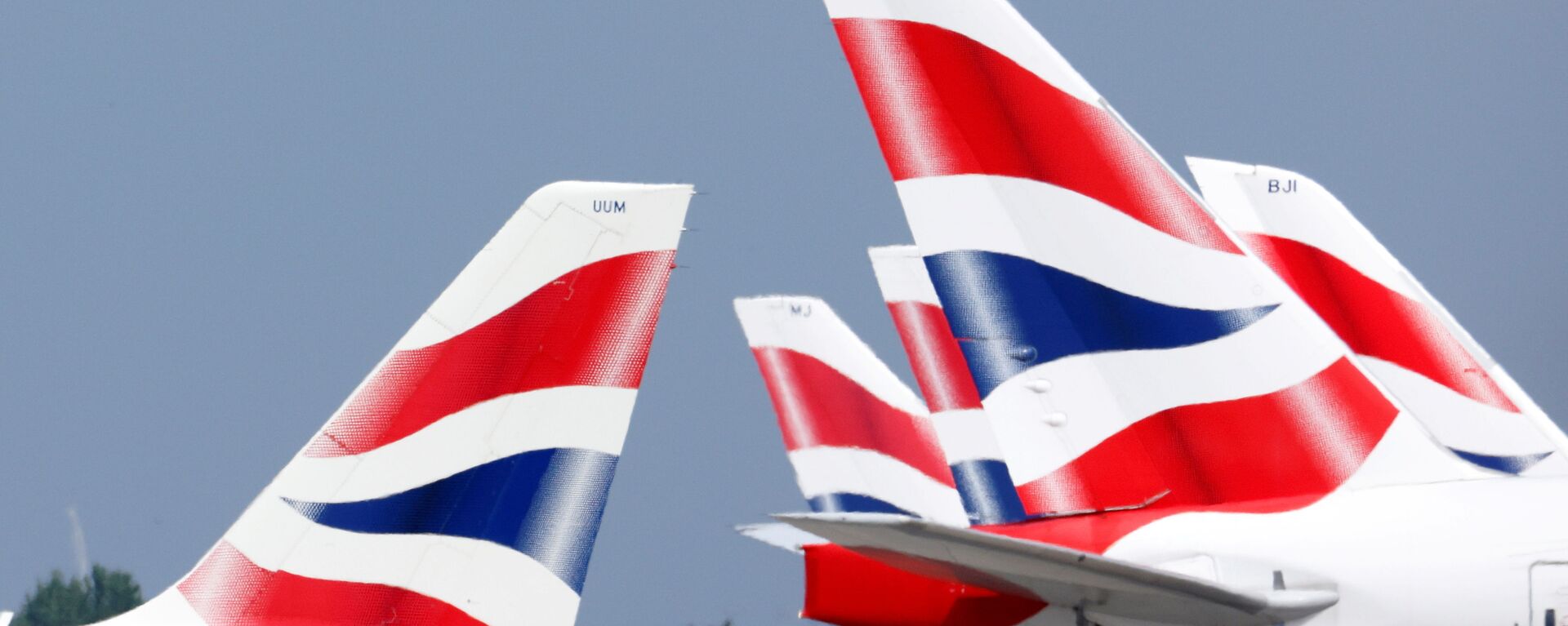  British Airways tail fins are pictured at Heathrow Airport in London, Britain, May 17, 202 - Sputnik International, 1920, 25.02.2022