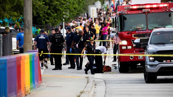 Police and firefighters respond after a truck drove into a crowd of people during The Stonewall Pride Parade and Street Festival in Wilton Manors, Florida, U.S. June 19, 2021 - Sputnik International
