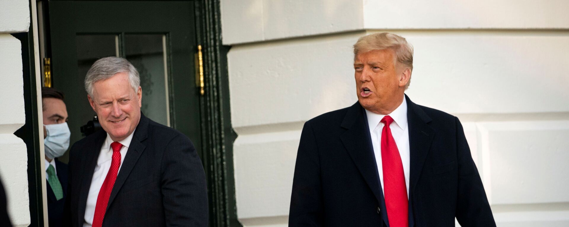 U.S. President Donald Trump departs with White House Chief of Staff Mark Meadows from the White House to travel to North Carolina for an election rally, in Washington, U.S., October 21, 2020. - Sputnik International, 1920, 30.11.2021