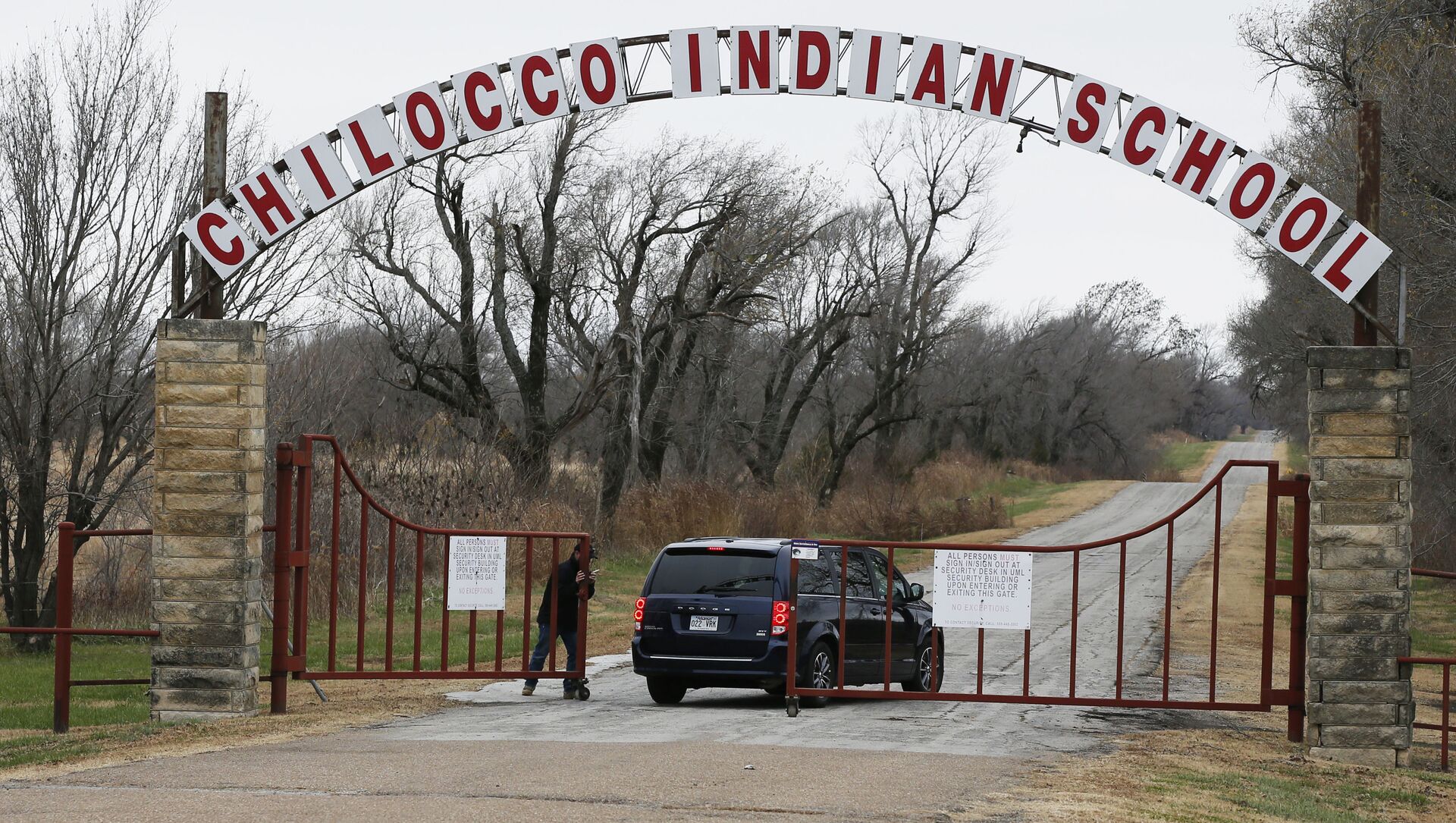 In this Wednesday, Nov. 29, 2017 file photo, a vehicle arrives at the abandoned Chilocco Indian School campus in Newkirk, Okla, Five American Indian tribes are opposing plans by the U.S. Department of Homeland Security to conduct bioterrorism drills at a tribal burial ground and abandoned boarding school, saying the agency didn't tell them that potentially dangerous substances could be used there. - Sputnik International, 1920, 22.06.2021