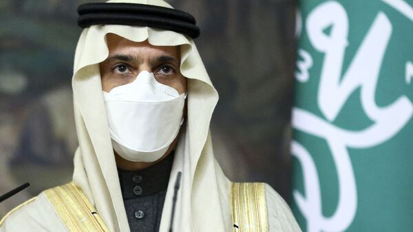 Saudi Foreign Minister Prince Faisal bin Farhan Al-Saud wearing in a face mask to protect himself against coronavirus attend a joint news conference with Russian Foreign Minister Sergey Lavrov following their talks in Moscow, Russia, Thursday, Jan. 14, 2021. - Sputnik International