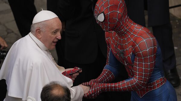 Pope Francis meets Spider-Man, who presents him with his mask, at the end of his weekly general audience with a limited number of faithful in the San Damaso Courtyard at the Vatican, Wednesday, June 23, 2021. The masked man works with sick children in hospitals. - Sputnik International