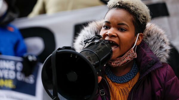 FILE PHOTO: Community activist India Walton speaks through a megaphone as she campaigns to replace four-term Mayor Byron Brown, in Buffalo, New York, U.S., December 15, 2020.  - Sputnik International