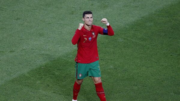 Soccer Football - Euro 2020 - Group F - Portugal v France - Puskas Arena, Budapest, Hungary on 23 June 2021, Portugal's Cristiano Ronaldo celebrates scoring their first goal  - Sputnik International