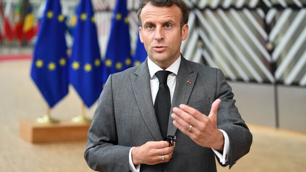 France's President Emmanuel Macron addresses the media as he arrives on the first day of the European Union summit at The European Council Building in Brussels, Belgium June 24, 2021. - Sputnik International