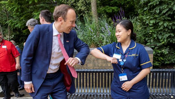 Britain's Health Secretary Matt Hancock meets NHS staff during a visit to Chelsea and Westminster Hospital in London, Britain on 17 June 2021.  - Sputnik International