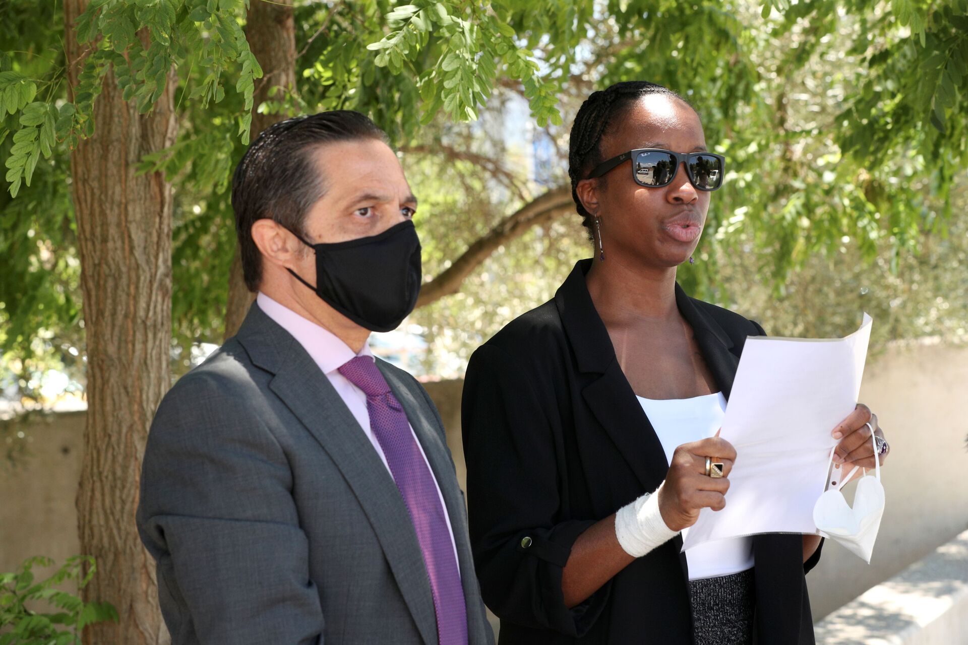 Janice McAfee, a wife of John McAfee, flanked by her lawyer Javier Villalba, speaks to media as she leaves the Brians 2 prison where her husband was found dead in his prison cell after the Spanish high court had authorised his extradition to the U.S., in Sant Esteve Sesrovires, Spain June 25, 2021. - Sputnik International, 1920, 07.09.2021