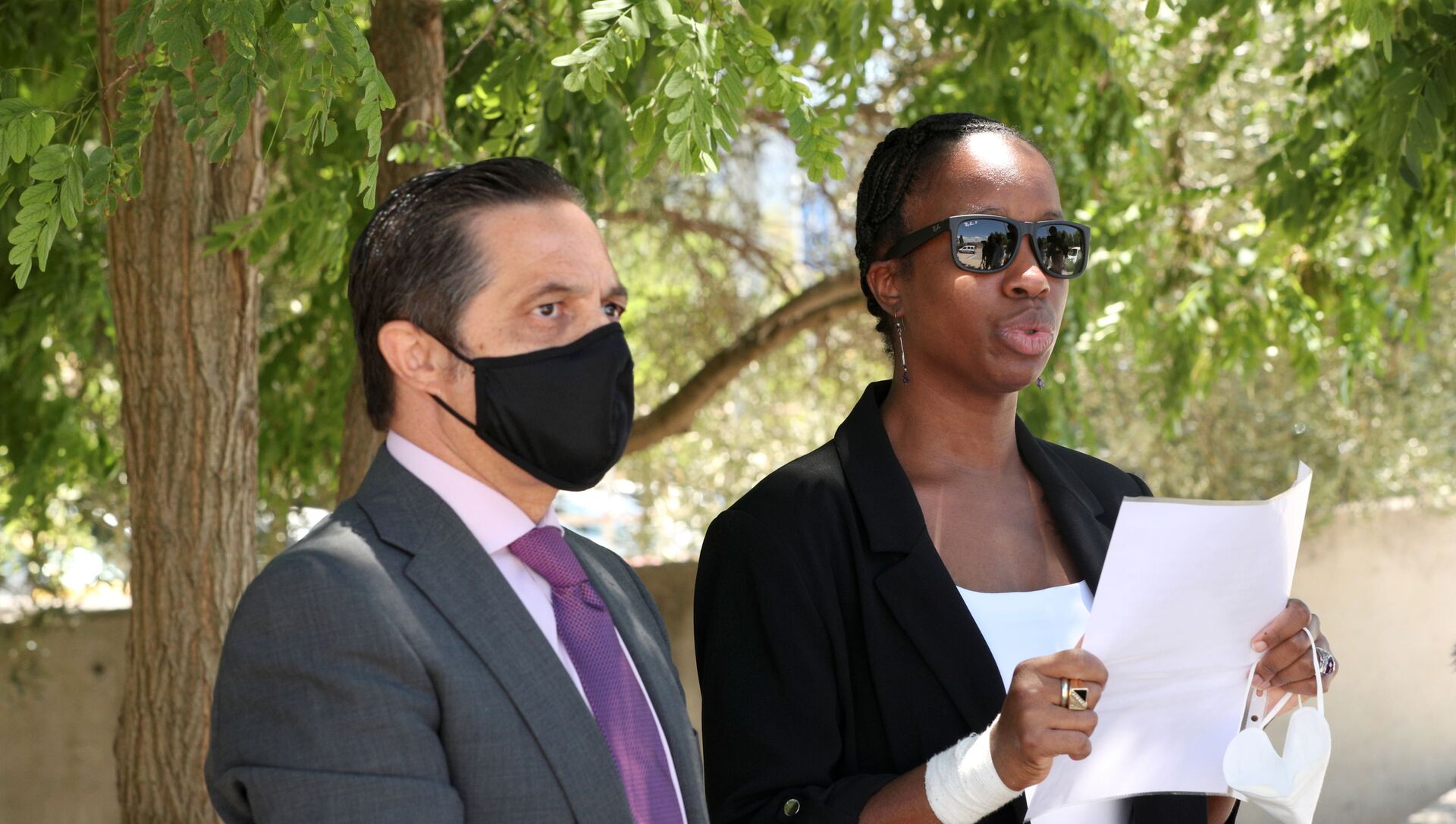 Janice McAfee, a wife of John McAfee, flanked by her lawyer Javier Villalba, speaks to media as she leaves the Brians 2 prison where her husband was found dead in his prison cell after the Spanish high court had authorised his extradition to the U.S., in Sant Esteve Sesrovires, Spain June 25, 2021. - Sputnik International, 1920, 25.06.2021