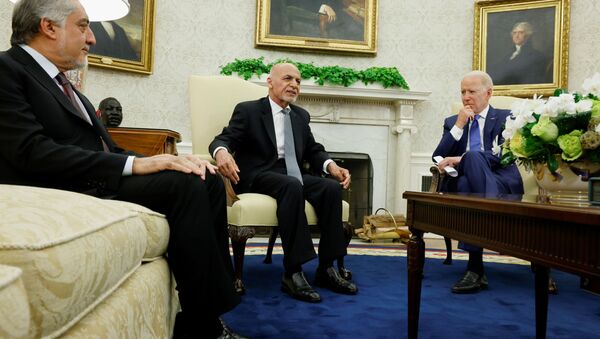 US President Joe Biden meets with Afghan President Ashraf Ghani and Chairman of Afghanistan's High Council for National Reconciliation Abdullah Abdullah at the White House, in Washington, DC, 25 June 2021. - Sputnik International