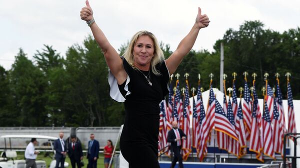 U.S. Rep. Marjorie Taylor Greene (R-GA) arrives as supporters of former U.S. President Donald Trump gather for his first post-presidency campaign rally at the Lorain County Fairgrounds in Wellington, Ohio, U.S., June 26, 2021. - Sputnik International