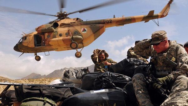 Humanitarian Aid Delivered to Afghan Village by NATO Training Mission-Afghanistan  - Sputnik International