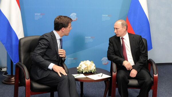 June 20, 2013. Russian President Vladimir Putin, right, and Prime Minister of the Netherlands Mark Rutte at a meeting at the 17th St. Petersburg International Economic Forum at Lenexpo - Sputnik International