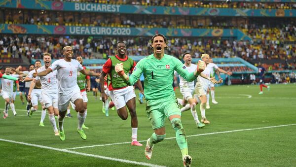 Soccer Football - Euro 2020 - Round of 16 - France v Switzerland - National Arena Bucharest, Bucharest, Romania - June 29, 2021   Switzerland's Yann Sommer celebrates after saving a penalty from France's Kylian Mbappe to win the shoot-out  - Sputnik International