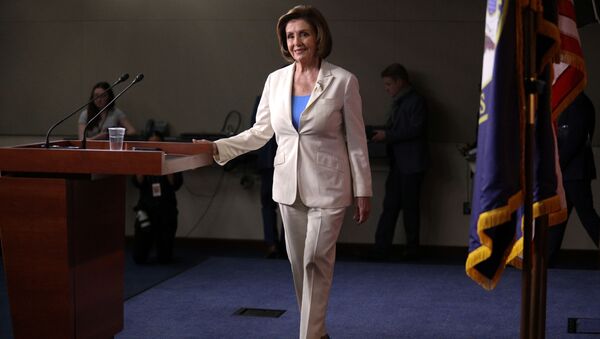 U.S. Speaker of the House Nancy Pelosi walks on stage before her remarks during a weekly news conference on Capitol Hill in Washington, U.S., June 24, 2021 - Sputnik International
