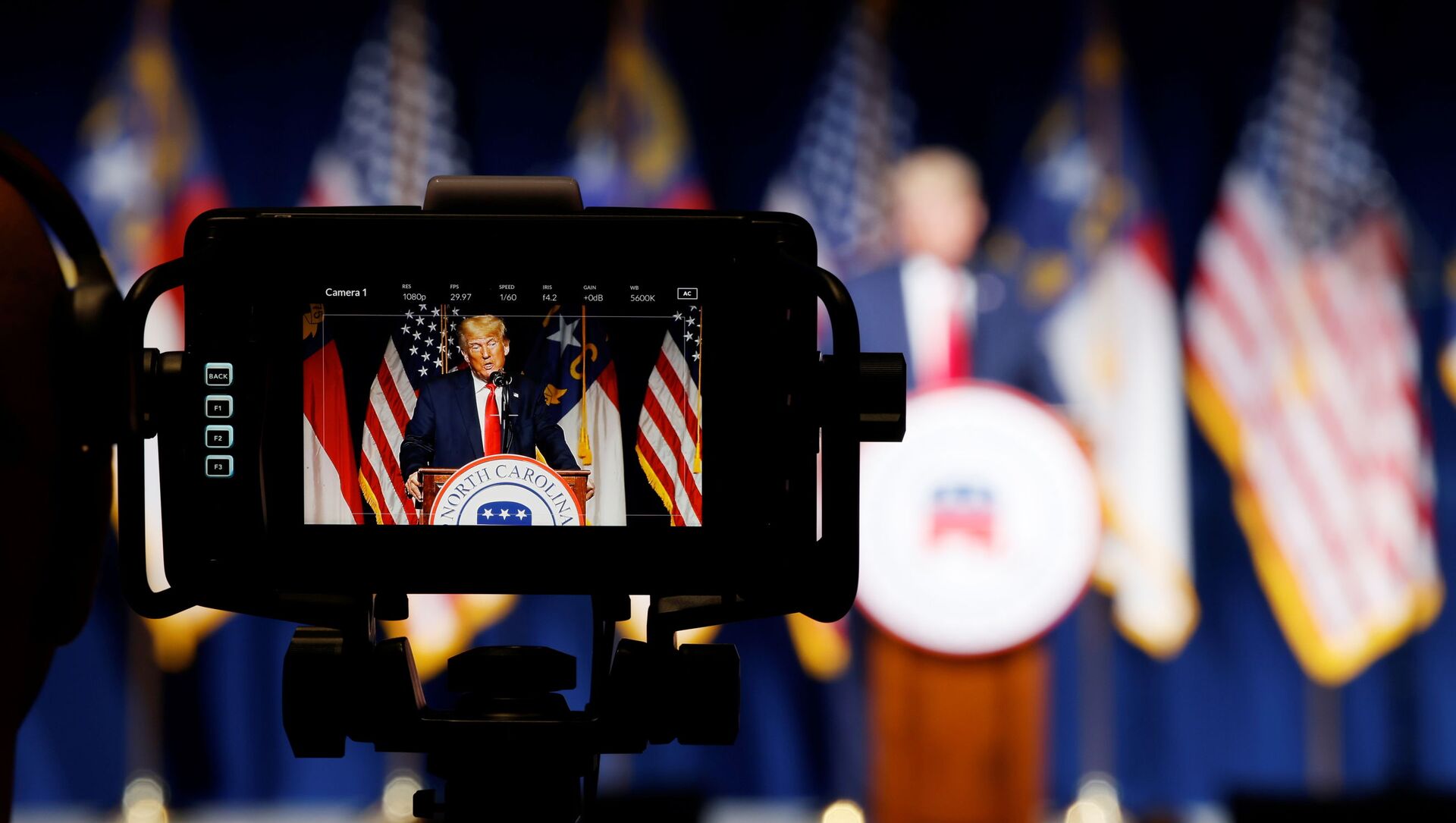 Former U.S. President Donald Trump is seen in a live television monitor as he speaks at the North Carolina GOP convention dinner in Greenville, North Carolina, U.S. June 5, 2021 - Sputnik International, 1920, 29.06.2021