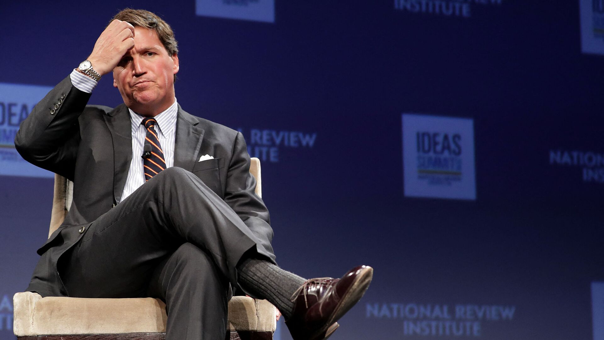 WASHINGTON, DC - MARCH 29: Fox News host Tucker Carlson discusses 'Populism and the Right' during the National Review Institute's Ideas Summit at the Mandarin Oriental Hotel March 29, 2019 in Washington, DC. - Sputnik International, 1920, 22.11.2021