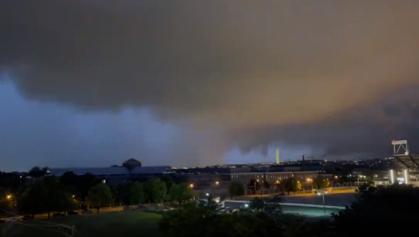 A tornado-producing storm as it passed through downtown Washington, DC, on the night of July 1, 2021 - Sputnik International